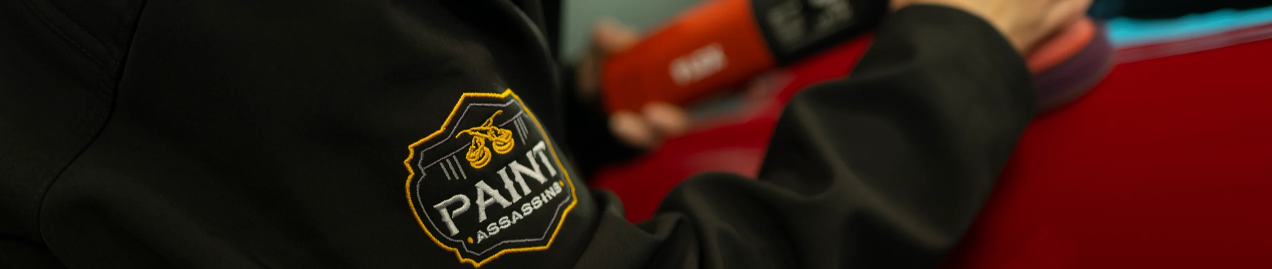 paint assassins emblem on a jacket